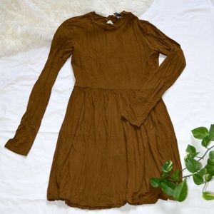 Brown long sleeved dress with open back